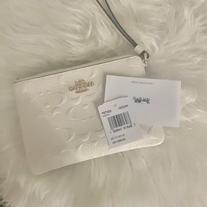 Coach Signature Embossed Zip Wristlet (authentic)